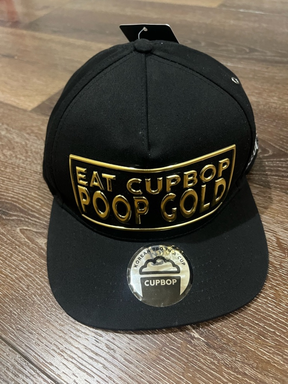 NWT CUPBOP Eat Cupbop Poop Gold Black Snapback Hat